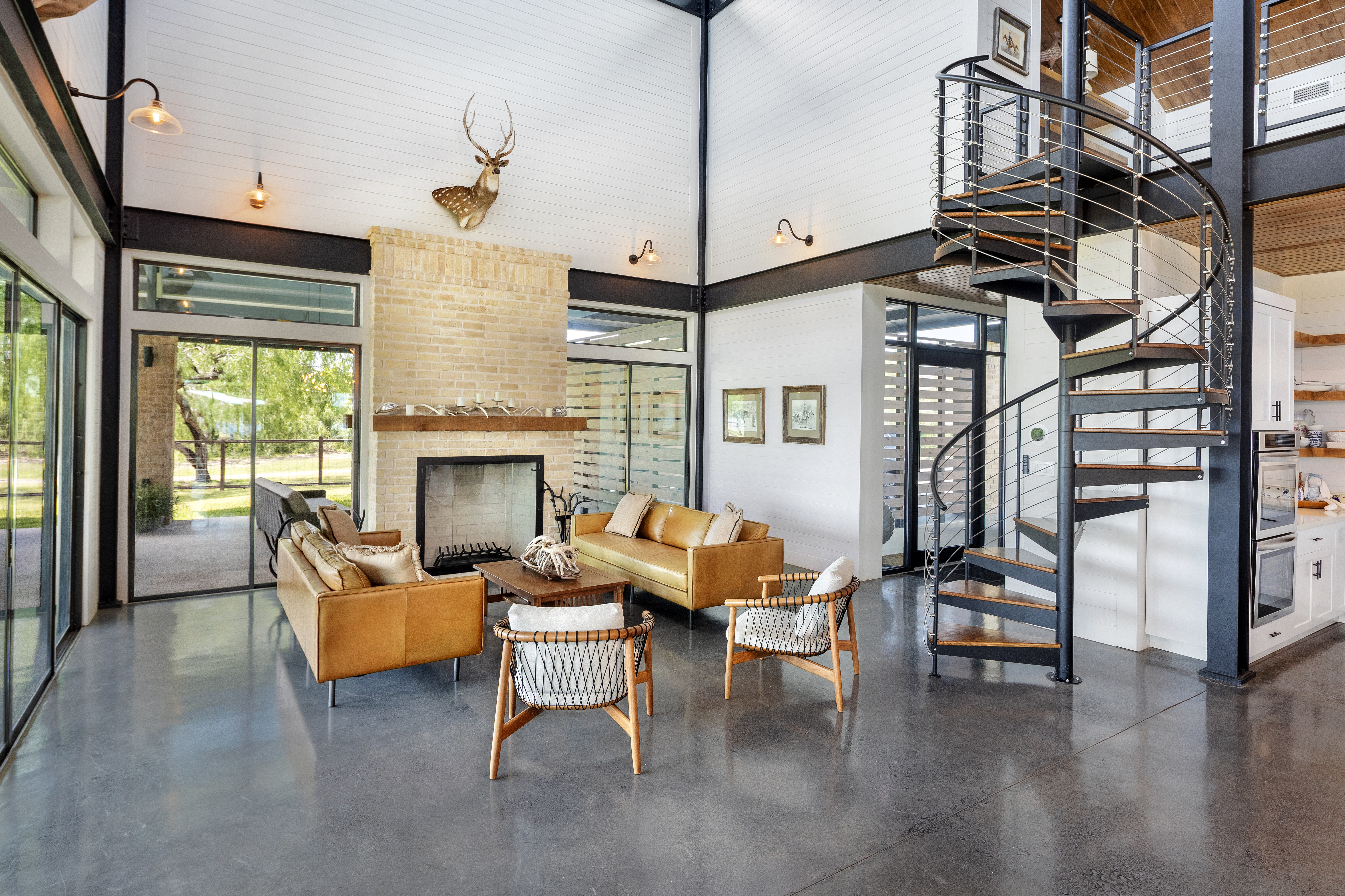 Los Agaves Ranch living room with spiral staircase