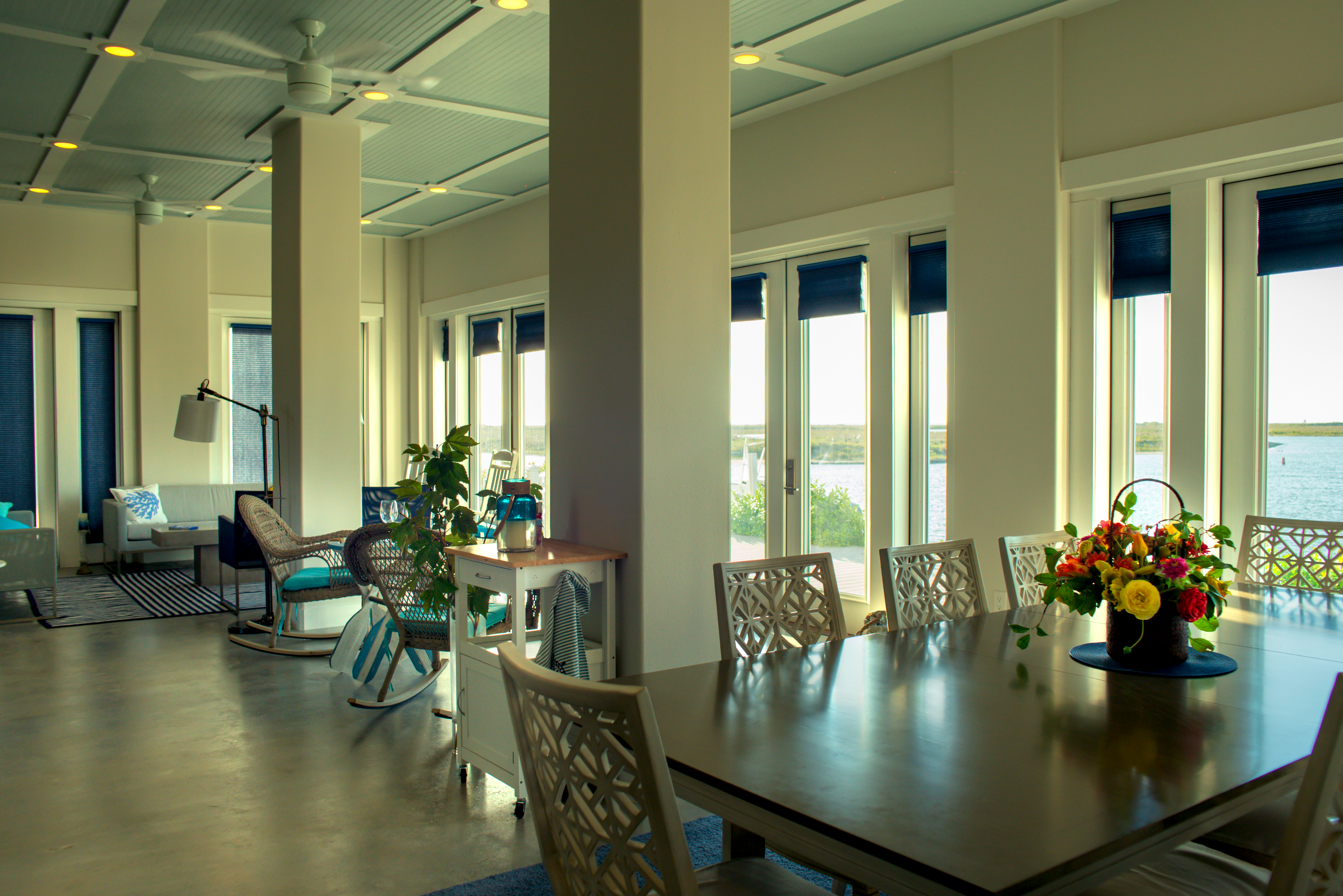 Open dining and living space with panoramic windows